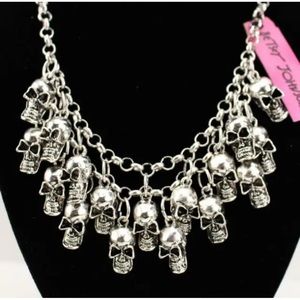 Betsey Johnson’s 17 skulls Necklace in Silver-tone.